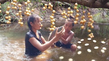 Survival in forest: Fish curry spicy with egg and Natural sour fruit for food in forest