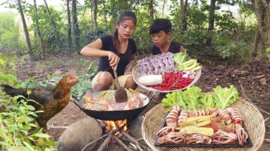 Squid spices chili cooking with mushroom for food in jungle, Survival cooking