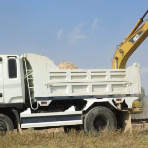 Excavator In Rice Field | Caterpillar 311B Excavator Loading Mercedes And MAN Trucks