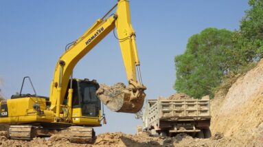 Komatsu pc 130 Excavator Loading Mercedes And MAN Trucks - New Canal Repairing