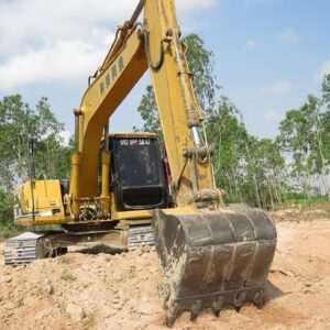 Caterpillar 312B Excavator Loading Mercedes And MAN Trucks - Excavator Working