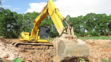KOMAT'SU PC 130 Excavator Working With Land Trucks _ Excavator Digging In Pond