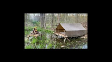 Man Builds a Survival Shelter on the Water's Edge