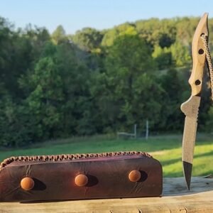 DOOMSDAY SURVIVAL LION'S TOOTHPICK TOPS KNIVES