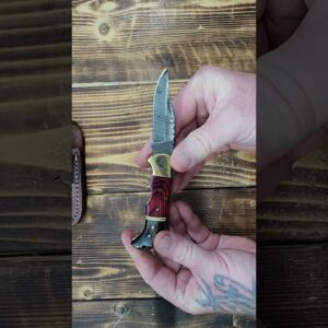 6.5 inch Damascus Folding Pocket Knife with Sheath  Black-Red Wood & Brass https://amzn.to/4iE7RjE