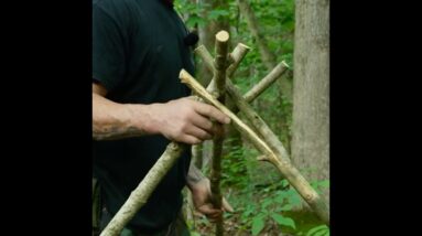 How To Build an Emergency Tripod Tarp Shelter Without Cordage
